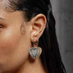 SS22 REVOLUTION. Sunburst Heart Hoop Earrings - Silver