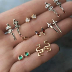 CLASSICS ROSEBUD. Garnet Trio Gold Stud Earrings